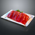Fresh Tuna Sashimi Slices Neatly Arranged On White Plate With Green Garnish