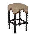 Beige Upholstered Stool With Dark Wooden Ball Decorative Legs And Trimmed Edge