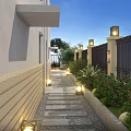 Elegant Garden Landscape With Lush Trees Outdoor Seating Water Feature And Paved Patio