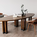 Oval Wooden Dining Table Set With Sturdy Legs Two Chairs Brown Cushions And Green Plants