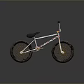Colorful Frame BMX Bicycle With Black Seat Handlebars And Gold Spokes Textured Tires