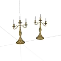 Decorative Golden Candelabras With Multiple Candle Arms And Ornate Bases