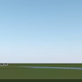 Aerial Planning View of Large Arched Building with River Roads Green Vegetation and Parking Areas