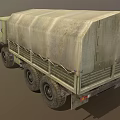 Green Military Cargo Truck With Canvas Covered Bed And Off Road Tires