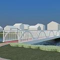 Scenic White Arch Bridge Over Water With Green Lawns White Houses And Blue Sky