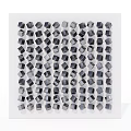 Geometric Art Installation With Black And Gray Cubes On White Square Board