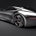 Silver Streamlined Sports Car with Red Seats Unique Wheels and Modern Sporty Design
