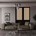 Beige Multi Seater Sofa With Brown Cushions Framed Paintings Rattan Walls And Coffee Table