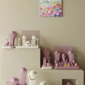 Elegant Jewelry Collection Display With Pastel Pink Stands And Mannequins