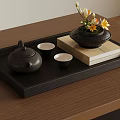 Traditional Tea Set on Black Tray with Book and Yellow Flower Vase