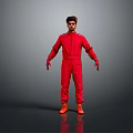 Man in Red Jumpsuit and Orange Shoes Standing Against Grey Background