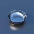 Elegant Stainless Steel Tableware Set Featuring Shiny Round Plate on Dark Background