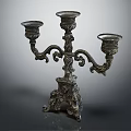 Vintage Ornate Metal Candelabra With Three Light Branches And Intricate Carvings