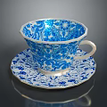 Blue and White Porcelain Teacup with Saucer Featuring Decorative Floral Patterns
