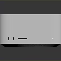 Apple Desktop Computer With Sleek Silver Design And Multiple Ports On Reflective Surface