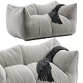 Cozy Modern Light Gray Fabric Two-Seater Sofa With Stitched Details And Dark Fringe Blanket