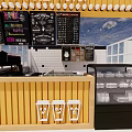 Modern Restaurant Interior With Menu Boards Coffee Machines Counter And Display Case