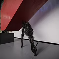 Modern Lounge Area Interior Design With Red Accent Wall Blue Lighting And Black Sculpture