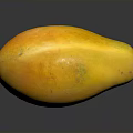 Ripe Yellow Mango on Dark Surface with Reflection