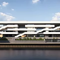 Modern School Building Exterior With White Facade Horizontal Lines And Waterfront View