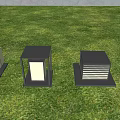 Modern Outdoor Lights With Various Designs On Green Lawn And Shrubs
