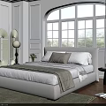 Double Bed In White Room With Arched Window Green Plants Wooden Floor And Rug