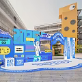 Vibrant Spring Campus Activity Installation With Cartoon Figure And Blue Yellow Design