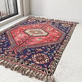 Traditional Square Rug With Intricate Red And Blue Patterns And Tassel Edges