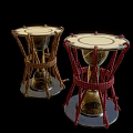 Two Traditional Musical Drums With Golden Painted Art And Red Brown Rope Decorations
