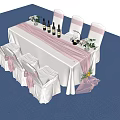 Elegant Banquet Table Setup With White Tablecloth Pink Chair Sashes Wine Bottles And Flower Bouquets