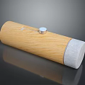Cylindrical Wooden Household Item With Gray End And Silver Button
