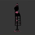 Black Mannequin Decorated With Pink Petals Standing In Dark Background