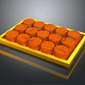 Orange Cup Shaped Pastries Arranged In Yellow Tray With Glossy Surface