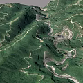 Aerial View Of Winding Mountain Roads In Lush Green Mountain Ranges