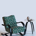 Green Patterned Armchair With Black Armrests And Side Table With Teapot Cups 3d model