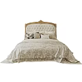 Elegant Double Bed with Carved Wooden Upholstered Headboard Decorative Pillows and Ornate Bedding