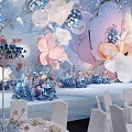 Elegant Banquet Hall With Floral Decorations Hanging Installations And White Chairs