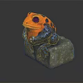 Colorful Frog Sculpture With Orange Blue Skin And Black Spots Sitting On Natural Rock