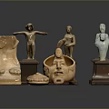 Artistic Carved Sculptures Including Standing Figures Masks And Animal Claws On Stands
