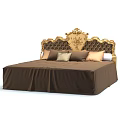 Luxurious Double Bed with Ornate Gold Carved Headboard and Brown Bedding Pillows