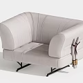 Cream Fabric Single Sofa With Stitched Details Curved Arms Metal Legs And Tassels
