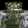 Floral Display With Green Foliage Background White Elephant Decoration And Illuminated Letters