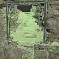 Ruined Stone Structure Interior With Metal Archway Broken Steps And Gravel Ground