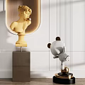 Elegant Modern Interior With Golden Bust Sculpture And White Panda Sculpture On Pedestals