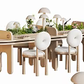 Modern Table And Chair Set With Round Padded Seats And Decorative Plants
