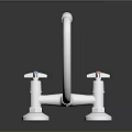 Sleek Polished Chrome Kitchen Faucet With Curved Spout And Round Bases