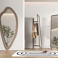 Irregular Shape Decorative Mirror In Modern Interior With Clothes Rack Green Plant And Spiral Rug
