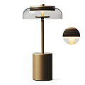 Sleek Modern Table Lamp With Transparent Lampshade And Golden Base Design
