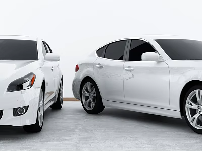 Two White Sedans Parked Side By Side In Indoor Studio Setting 3d model