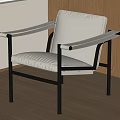 Modern Leisure Chair With White Cushioned Seat Black Metal Frame And Wooden Wall